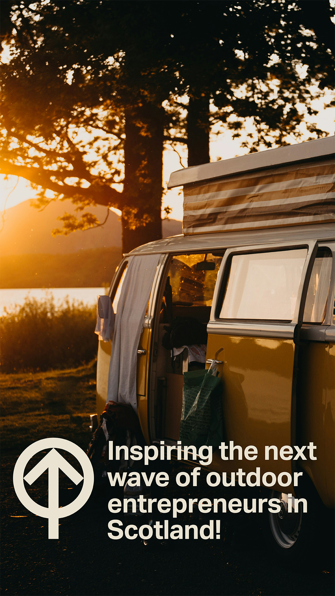 Camper van with door open sun setting