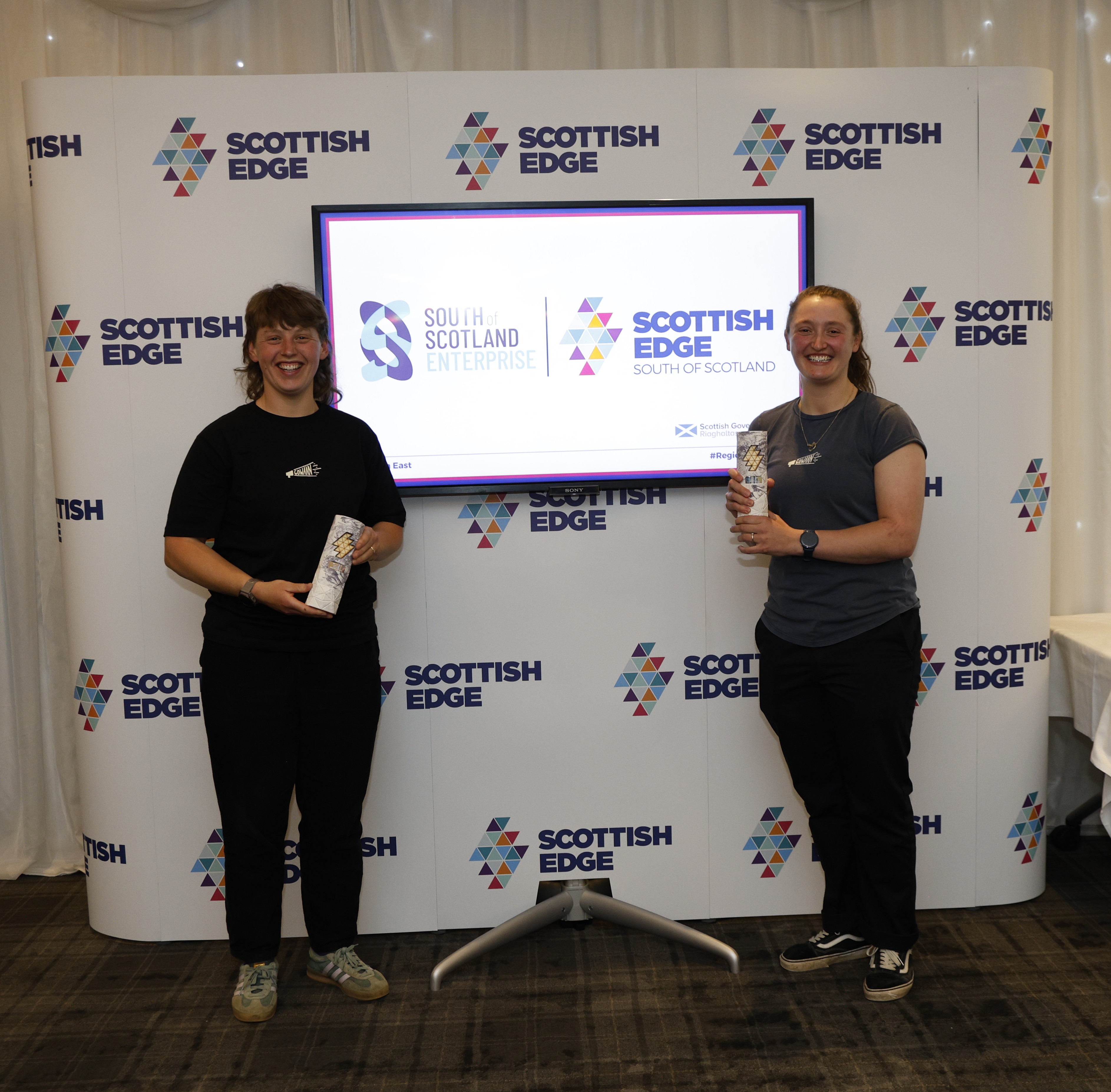 Bex Baracona And Chloe Taylor Of Gowaans Bike Club  holding their award
