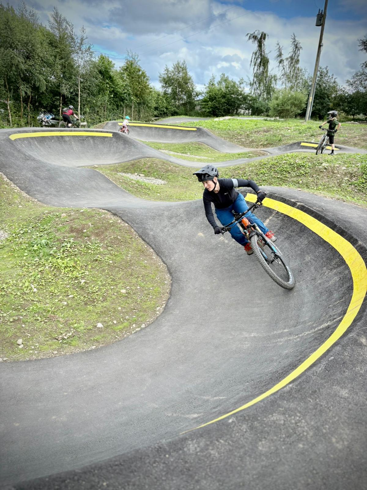 Associate Professor Lesley Ingram-Sills on mountain bike 