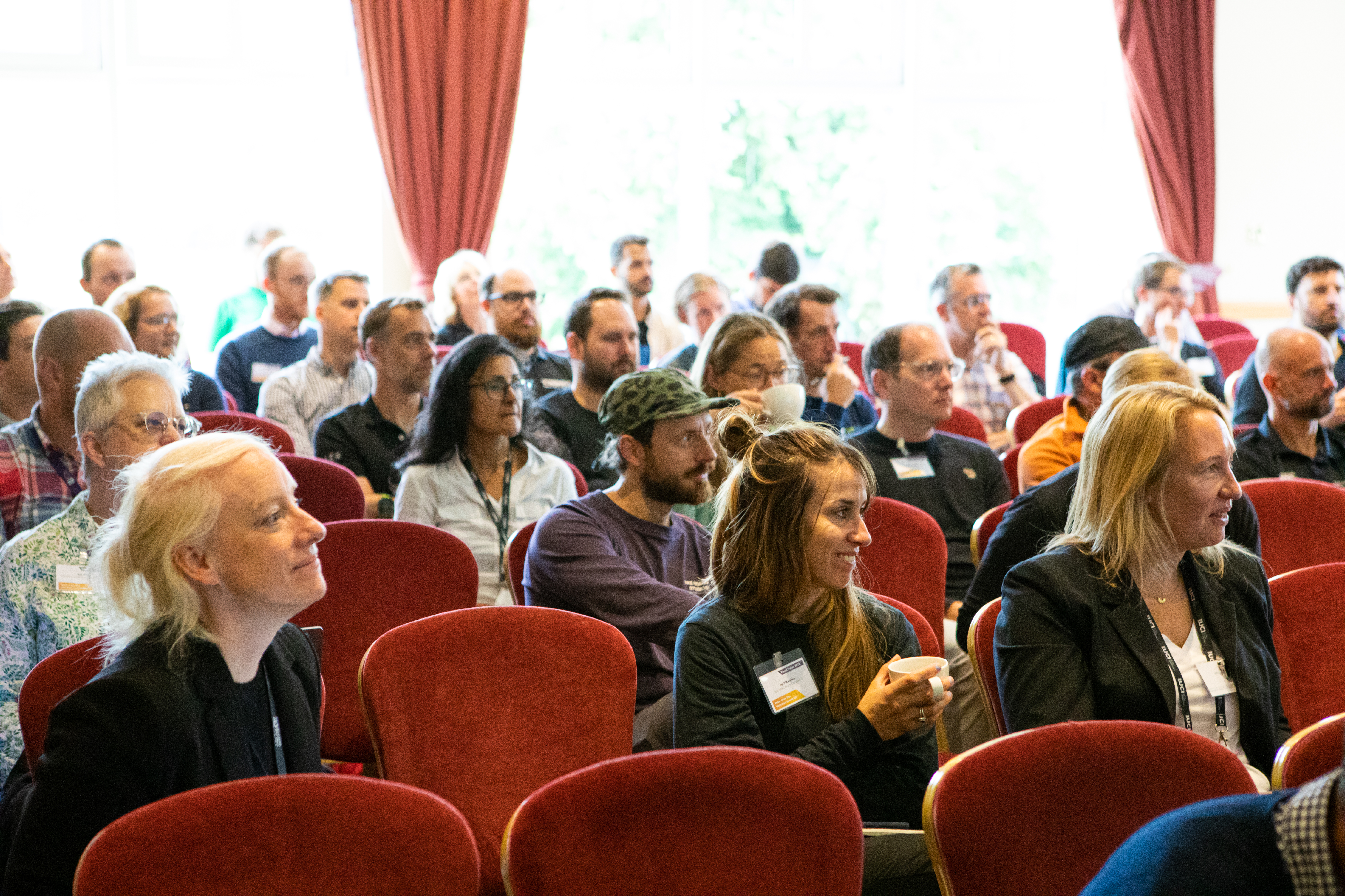 People sitting at an event 